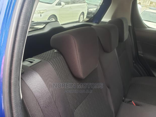 Teal 2015 Suzuki Swift - Pre-owned Compact Vehicle