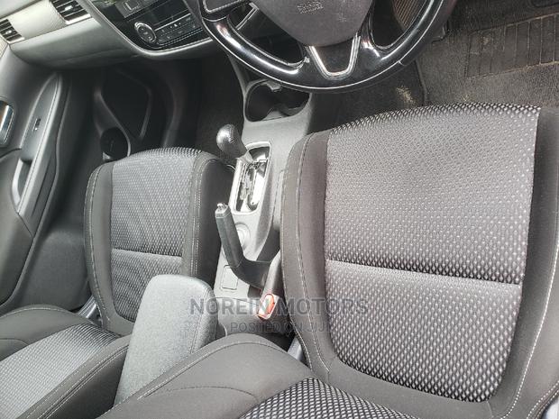 2015 Mitsubishi Outlander in Burgundy: Affordable and Stylish