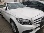 Off-White 2015 Mercedes-Benz C180 Sedan: Premium Style for sale