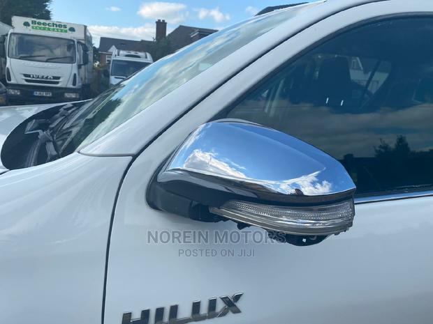 Beige 2016 Toyota Hilux - Perfect for Outdoor Life