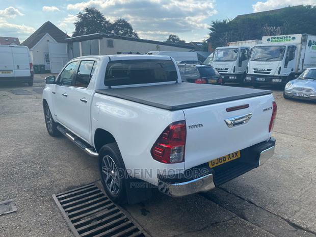 Beige 2016 Toyota Hilux - Perfect for Outdoor Life