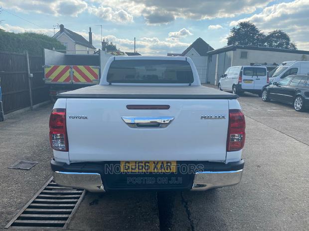 Beige 2016 Toyota Hilux - Perfect for Outdoor Life