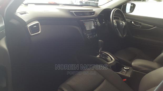 Red 2014 Nissan X-Trail: Stylish and Powerful SUV
