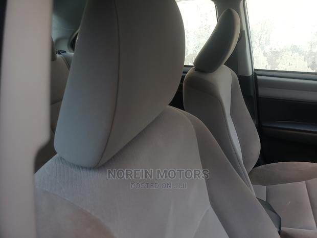 Experience the 2015 Toyota Axio in Ivory: Style and Performance