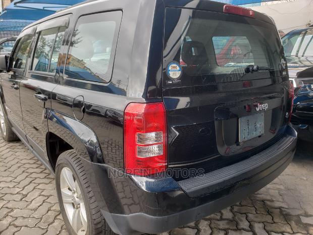 2014 Jeep Compass Black: Rugged and Stylish SUV for Less