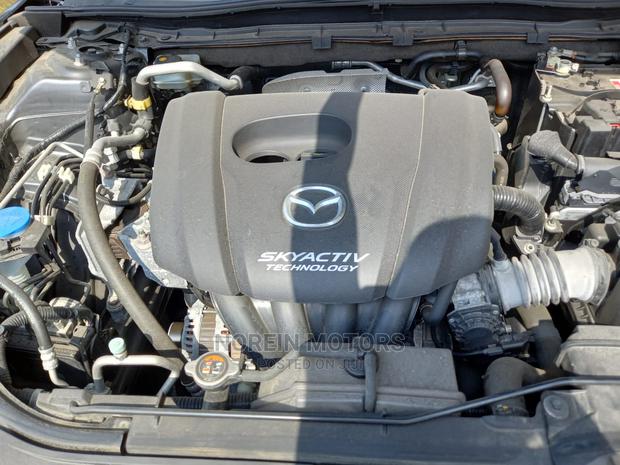 Pre-owned Mazda Axela 2015 Black: Elegant Sedan for Sale