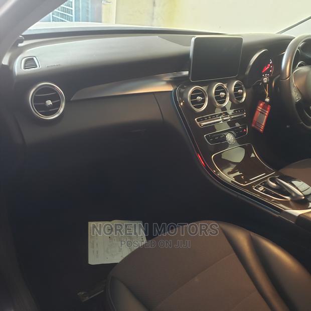 Used 2015 Mercedes-Benz C200 in Burgundy: Classic Sedan for Sale