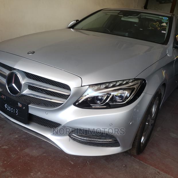 Used 2015 Mercedes-Benz C200 in Burgundy: Classic Sedan for Sale