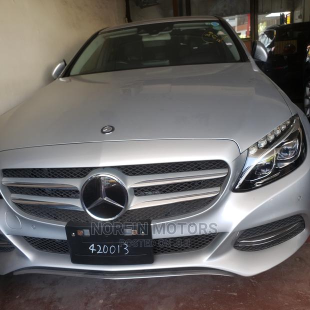 Used 2015 Mercedes-Benz C200 in Burgundy: Classic Sedan for Sale