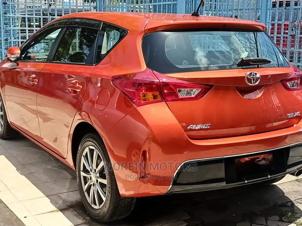 2015 Orange Toyota Auris: Spacious and Reliable Compact Car