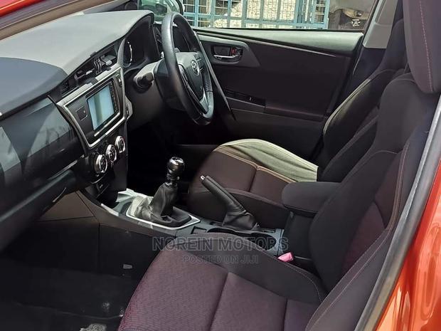 2015 Orange Toyota Auris: Spacious and Reliable Compact Car