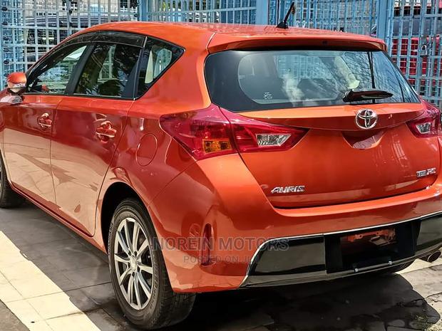 2015 Orange Toyota Auris: Spacious and Reliable Compact Car