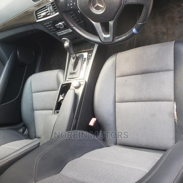 Off White 2014 Mercedes-Benz C180: Exquisite Luxury Sedan