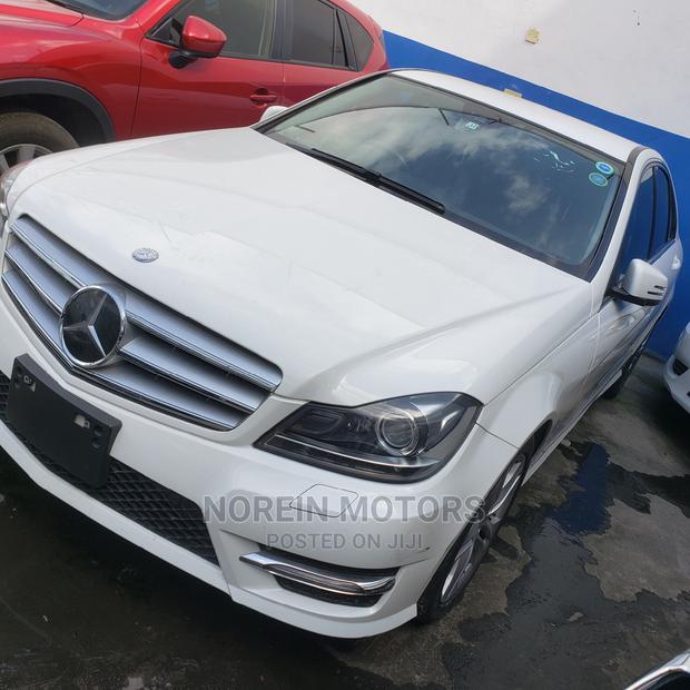 Off White 2014 Mercedes-Benz C180: Exquisite Luxury Sedan