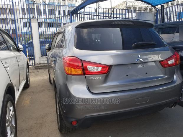 Teal 2014 Mitsubishi RVR: Compact, Stylish, and Ready for Adventure