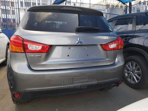 Teal 2014 Mitsubishi RVR: Compact, Stylish, and Ready for Adventure