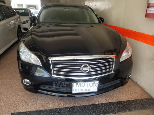 Stylish 2014 Nissan Fuga Black: Pre-Owned Sedan