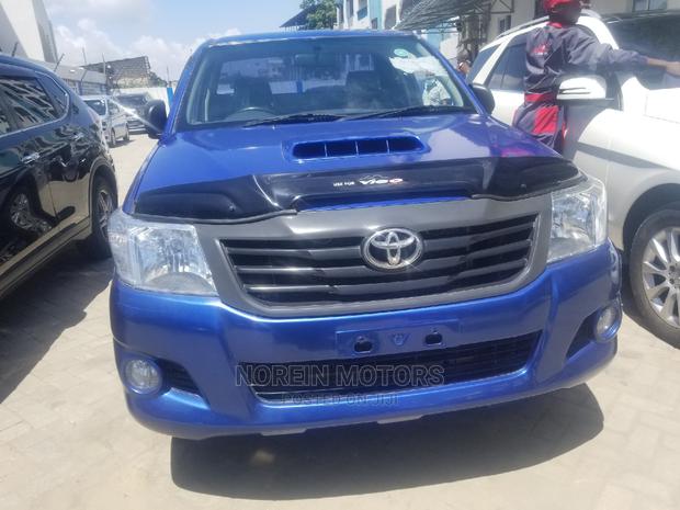 Blue 2014 Toyota Hilux: Dynamic Off-Road Performance