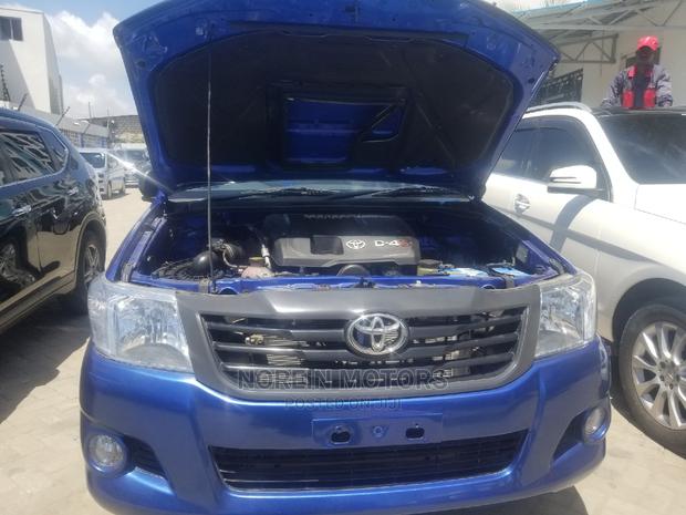 Blue 2014 Toyota Hilux: Dynamic Off-Road Performance