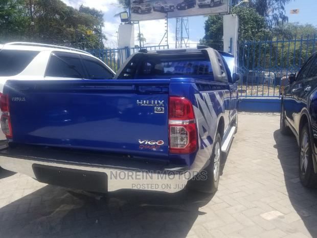 Blue 2014 Toyota Hilux: Dynamic Off-Road Performance