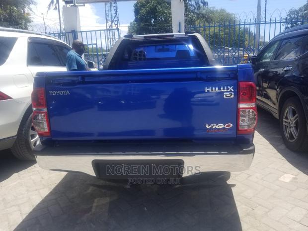 Blue 2014 Toyota Hilux: Dynamic Off-Road Performance
