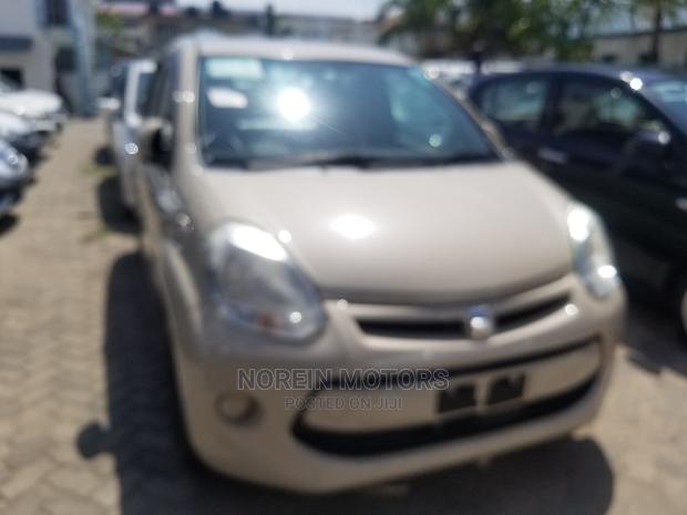 2015 Beige Toyota Passo: Stylish and Reliable Ride