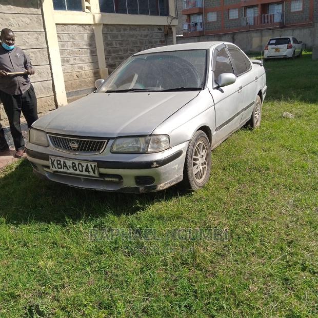 2000 Nissan FB15 in Silver: Perfect for Daily Commute