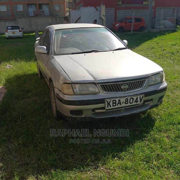 2000 Nissan FB15 in Silver: Perfect for Daily Commute