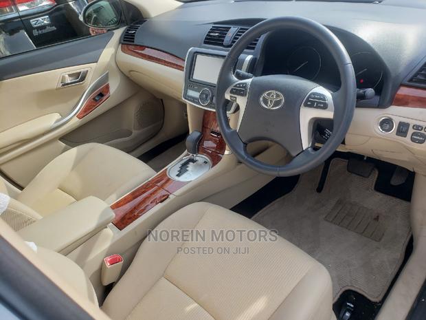 2014 Toyota Premio Blue: Affordable and Eco-Friendly