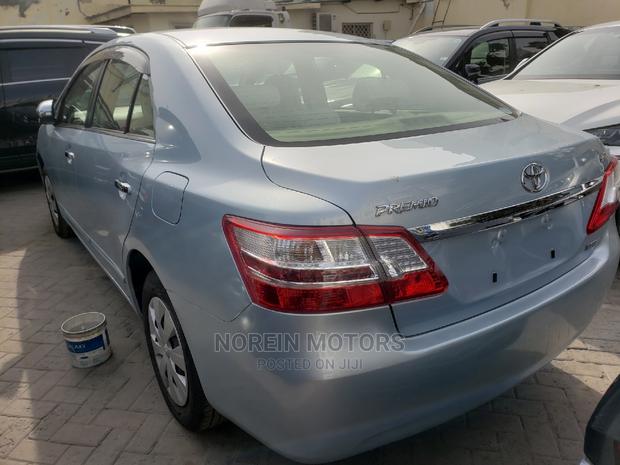 2014 Toyota Premio Blue: Affordable and Eco-Friendly