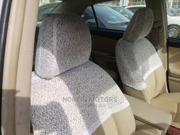 2014 Toyota Premio Blue: Affordable and Eco-Friendly