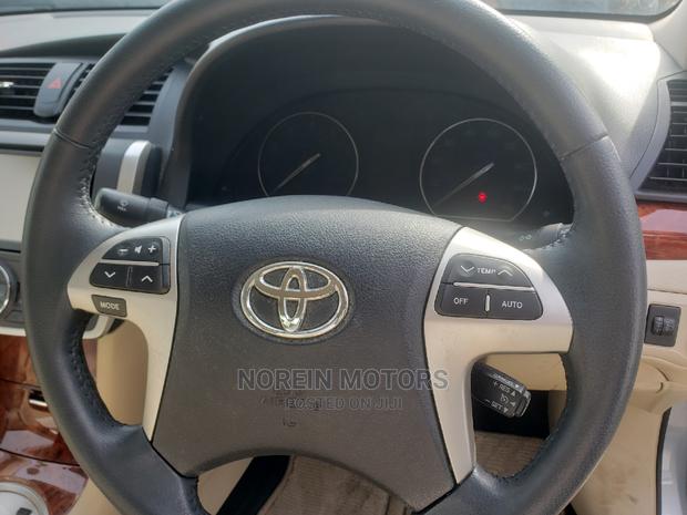 2014 Toyota Premio Blue: Affordable and Eco-Friendly