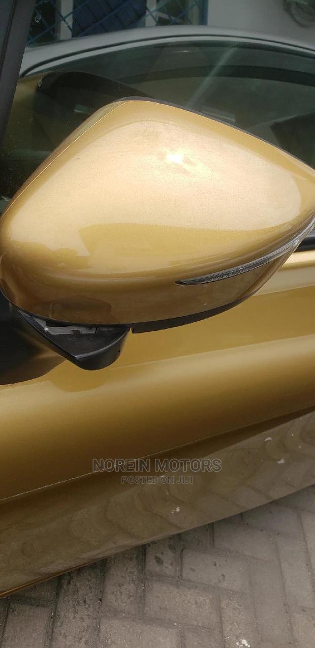 2014 Nissan Note Premium Gold: Compact Car with Premium Features at a Great Price