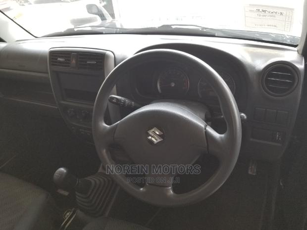 2014 Blue Jimny Suzuki: Small but Mighty 4x4 Adventure Vehicle