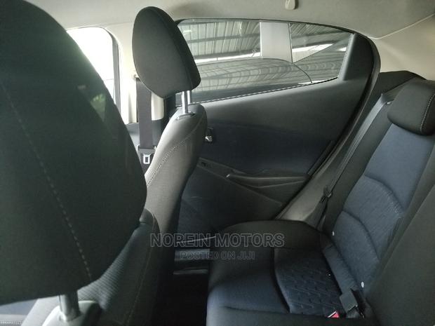 Used Brown Mazda Demio 2014 - Compact Car with Style and Comfort for Less