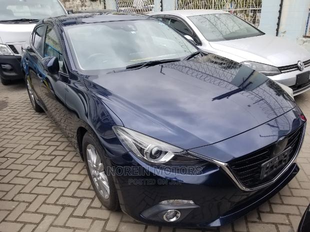 2014 Mazda Axela Blue SV Premium: Affordable Luxury Sedan