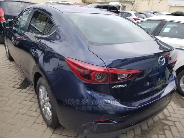 2014 Mazda Axela Blue SV Premium: Affordable Luxury Sedan