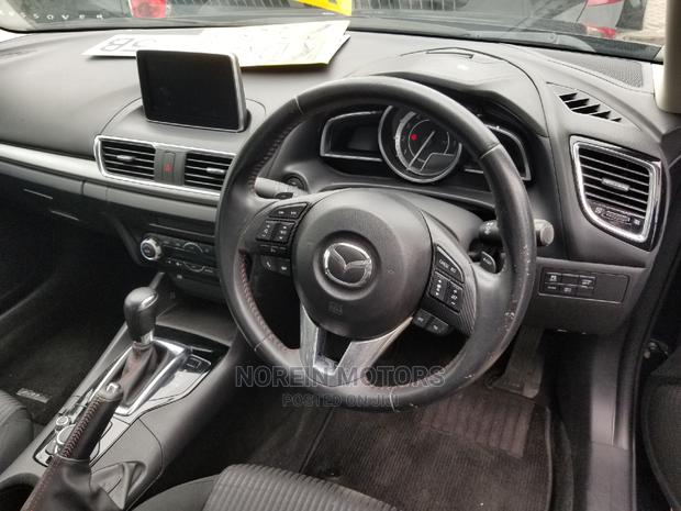 2014 Mazda Axela Blue SV Premium: Affordable Luxury Sedan