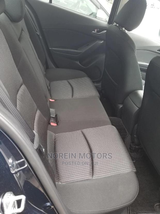 2014 Mazda Axela Blue SV Premium: Affordable Luxury Sedan