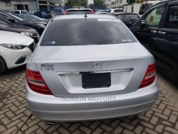 2014 Ivory Mercedes-Benz C180 - A Stylish Compact Sedan