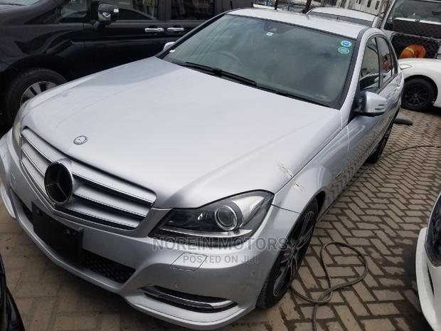 2014 Ivory Mercedes-Benz C180 - A Stylish Compact Sedan
