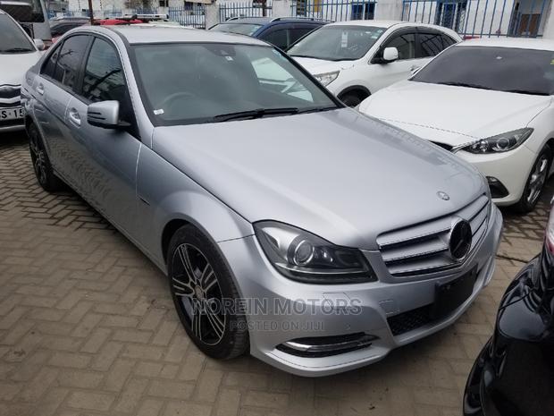 2014 Ivory Mercedes-Benz C180 - A Stylish Compact Sedan