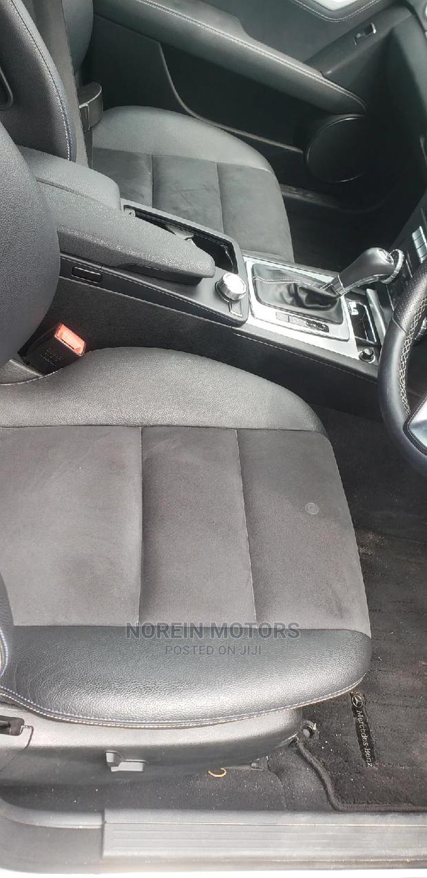 2014 Mercedes-Benz C180 Burgundy - Elegant Sedan with Power and Comfort