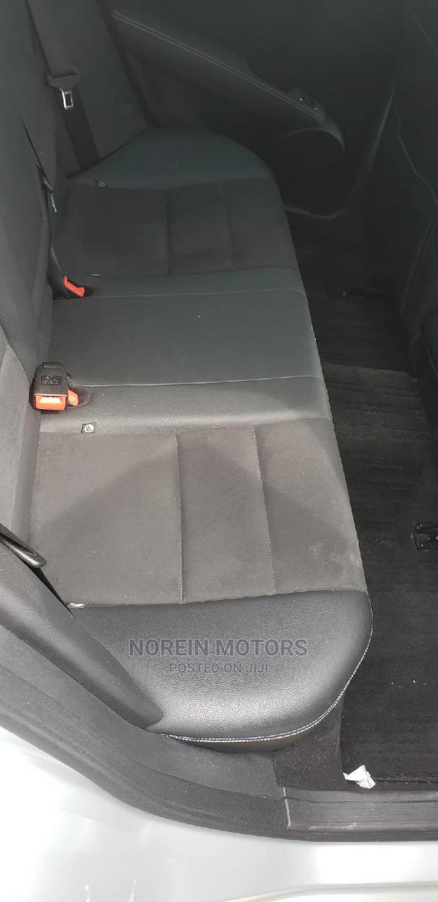 2014 Mercedes-Benz C180 Burgundy - Elegant Sedan with Power and Comfort