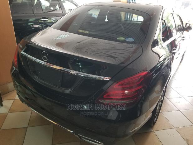 Pre-owned 2014 Mercedes-Benz C180 with Black Exterior