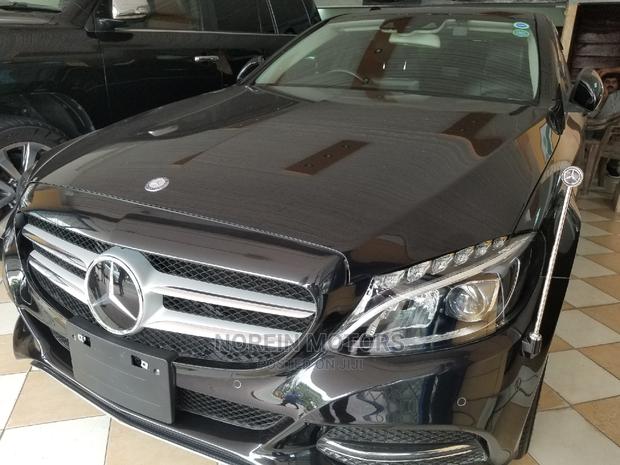 Pre-owned 2014 Mercedes-Benz C180 with Black Exterior