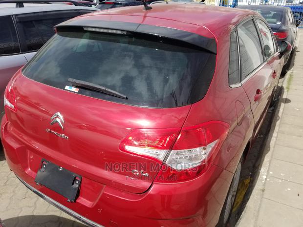Red 2014 Citroen C4: A Compact Car with a Classy Red Exterior
