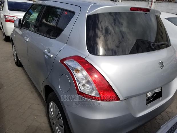 2014 Suzuki Swift Silver - Style, Comfort, and Power in One
