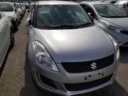 2014 Suzuki Swift Silver - Style, Comfort, and Power in One for sale