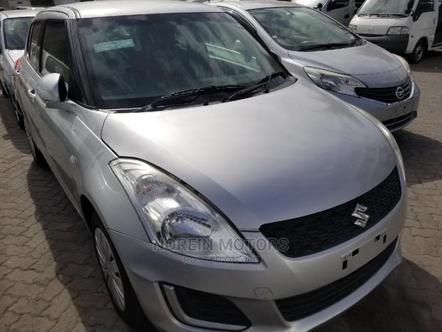 2014 Suzuki Swift Silver - Style, Comfort, and Power in One